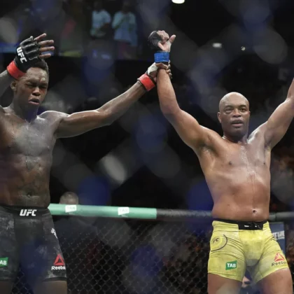 Reigning UFC champion Israel Adesanya (L) and Anderson Silva are the two greatest middleweights in MMA history. Adesanya defends his title Saturday in Sydney, Australia, against Sean Strickland in the main event of UFC 293. (Andy Brownbill/The Associated Press)