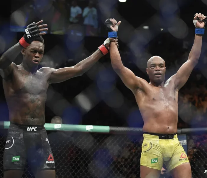 Reigning UFC champion Israel Adesanya (L) and Anderson Silva are the two greatest middleweights in MMA history. Adesanya defends his title Saturday in Sydney, Australia, against Sean Strickland in the main event of UFC 293. (Andy Brownbill/The Associated Press)